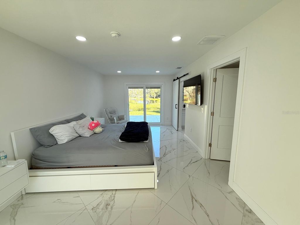 Photo of 1210 Sunset Lane, Lutz, FL 33549 (MLS # TB8414540)