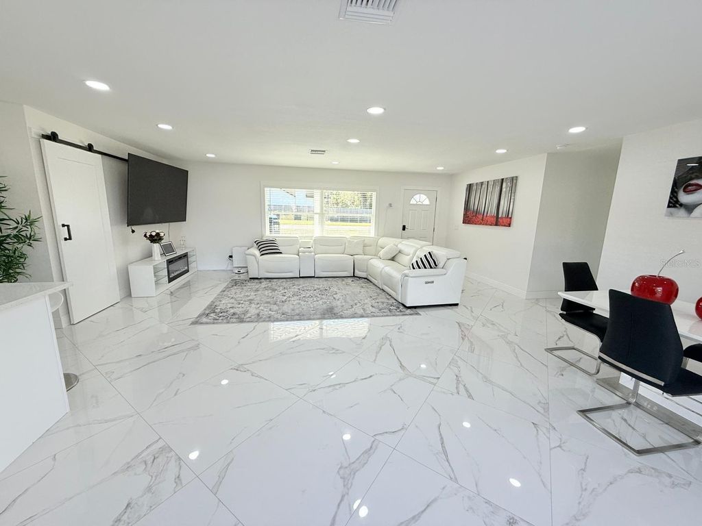 Photo of 1210 Sunset Lane, Lutz, FL 33549 (MLS # TB8414540)