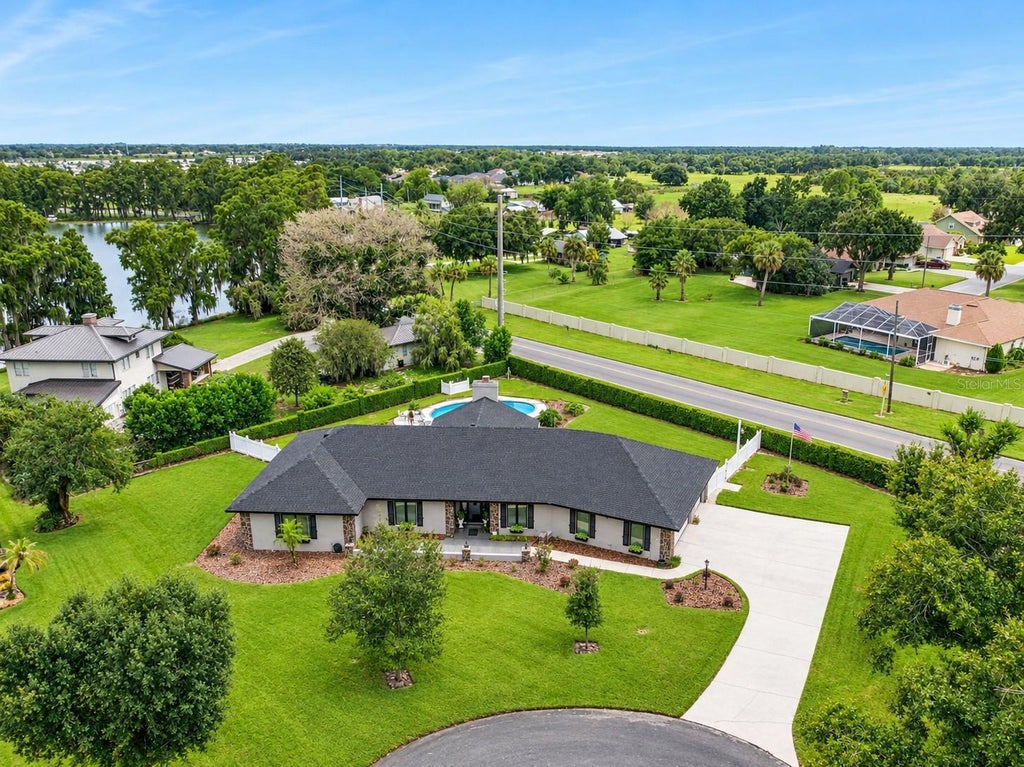 Photo of 37 Lake Eloise Lane, Winter Haven, FL 33884 (MLS # P4940000)