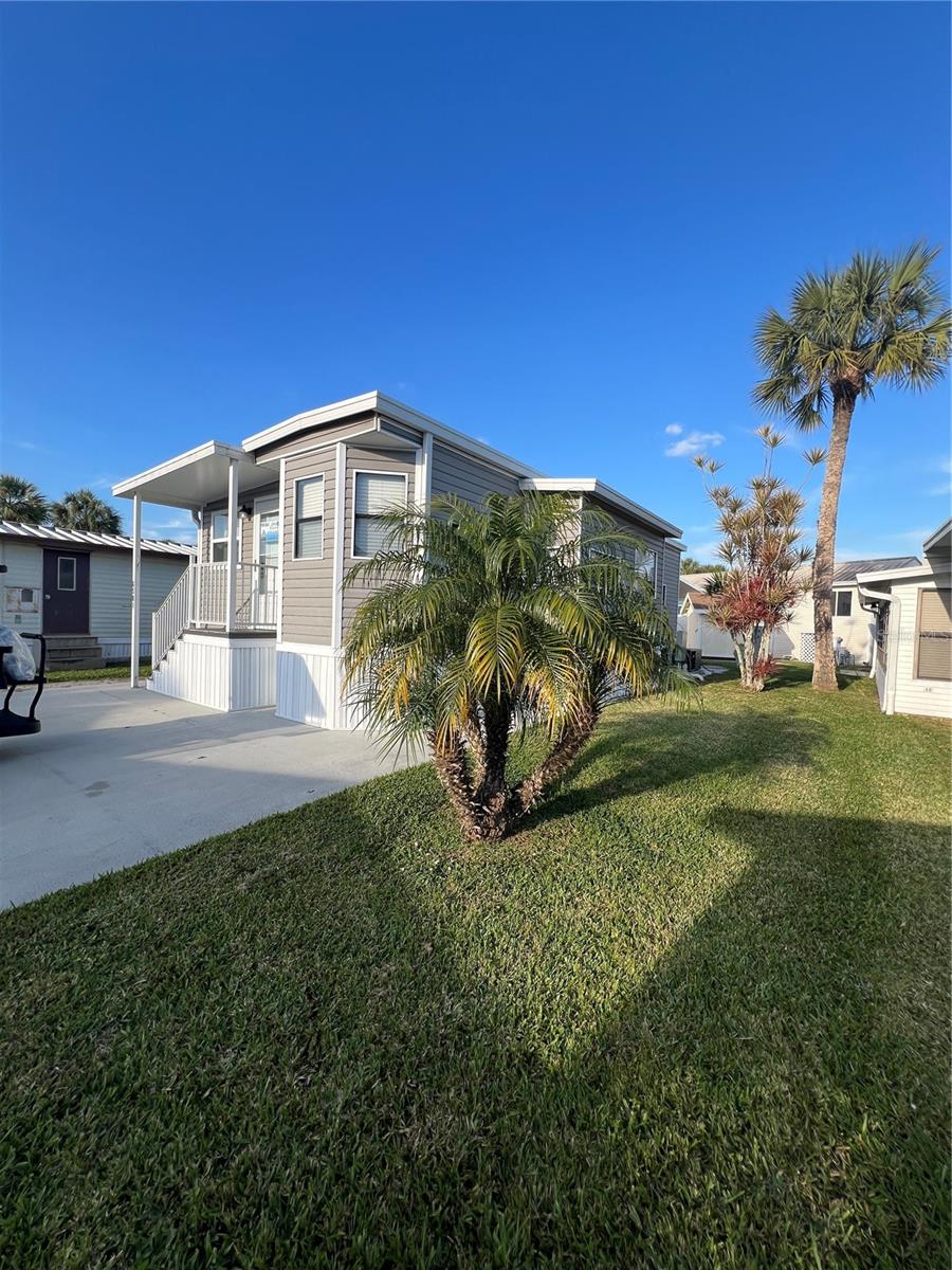 ~Ancient Oaks~ 55+ Community. This one is a cutie! 2 Bed 2 Full baths (walk in showers). 2016 Forest River Destination 40'. Completely redone, new plumbing, 2019 metal roof, AC is 2019 w/ all new duct work. LED lights throughout. 3/4" plywood on the floors, covered with Laminate by Jeanette Interiors .Corian countertops, new bathrooms, impact windows. 2 Tv's stay. Gas oven. SS Appliances. New gutters! Gray pavers to match the home. All measurements are approximate- must measure for exact.