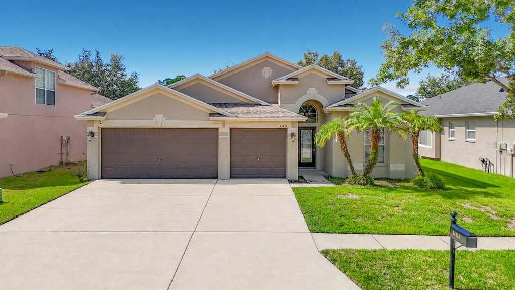 Photo of 34434 Windknob Court, Wesley Chapel, FL 33545 (MLS # TB8539636)