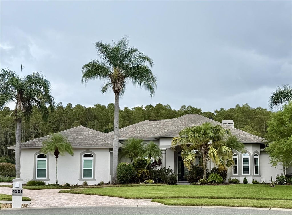 Photo of 4301 Place Le Manes, Lutz, FL 33558 (MLS # J1005033)