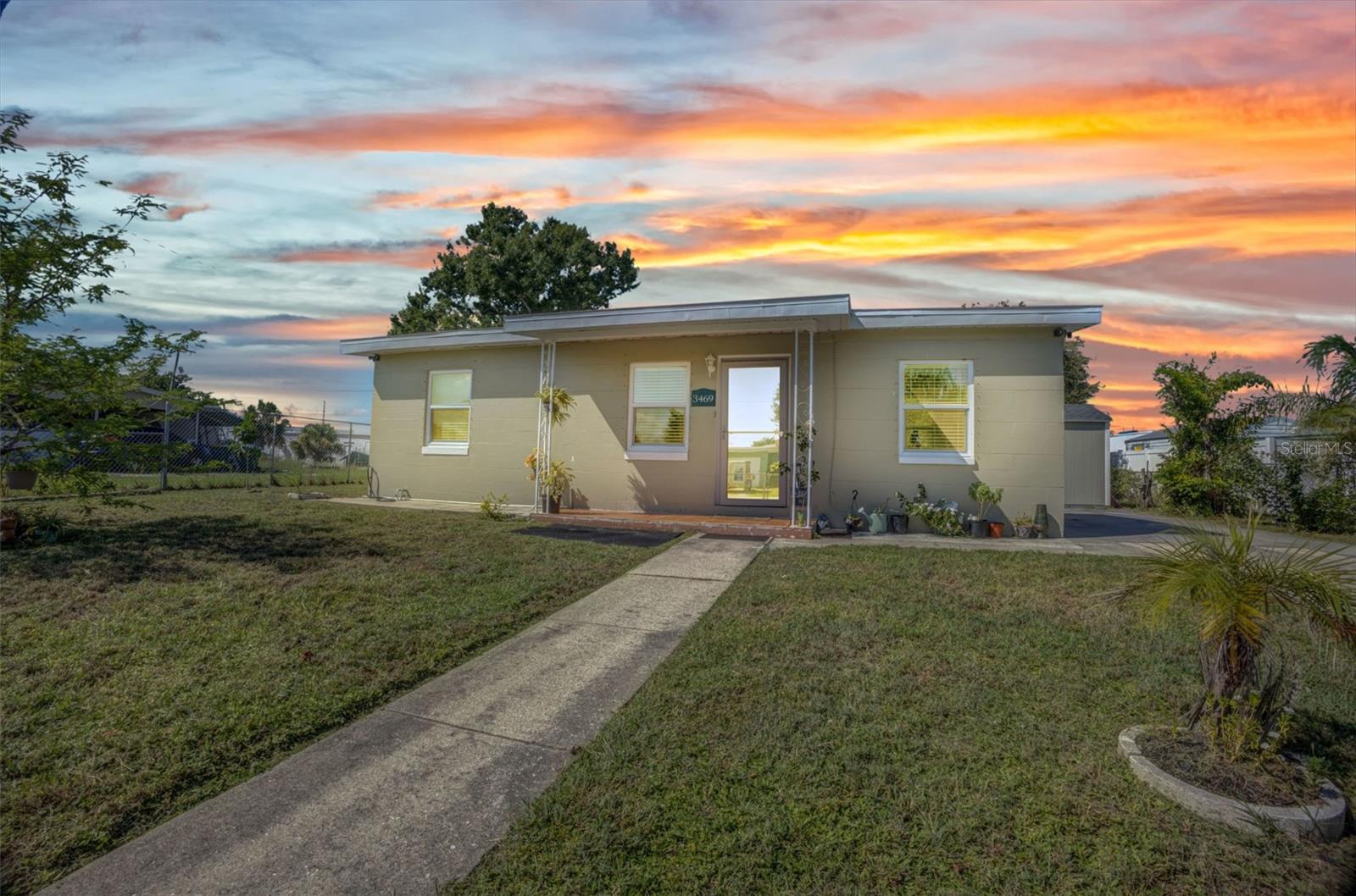 Welcome to this charming and well-maintained home located in the heart of Port Charlotte! This move-in ready property features a range of valuable updates, including newer energy-efficient windows, central AC for year-round comfort, a newer roof providing peace of mind, a water heater recently replaced for added efficiency, and an upgraded electrical panel completed in 2016. Equipped with four exterior house cameras and hurricane shutters, this home offers both security and storm protection. Step outside to enjoy a spacious, fully fenced backyard—perfect for pets, kids, entertaining, or simply relaxing in your private outdoor space. Whether you’re a first-time homebuyer, downsizing, or looking for a solid investment, this home offers the perfect blend of comfort, convenience, and practicality. Located just minutes from shopping centers, restaurants, medical facilities, and everything Port Charlotte has to offer, this home truly combines location and value in one beautiful package. Don’t miss the opportunity to make this home yours!