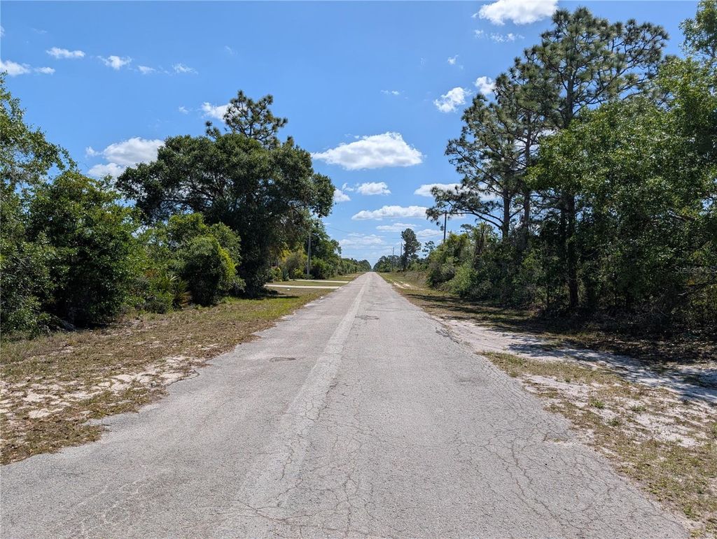 Photo of 816 Bougainville Drive, Indian Lake Estates, FL 33855 (MLS # P4938510)