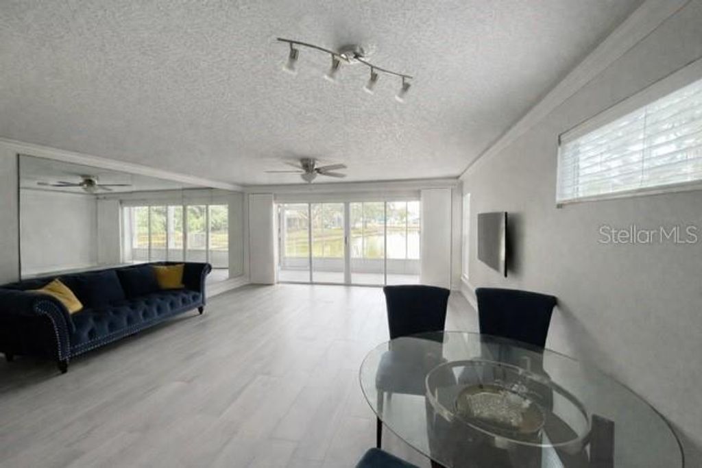 Photo of 9030 Lake Place Lane, Tampa, FL 33634 (MLS # TB8487927)