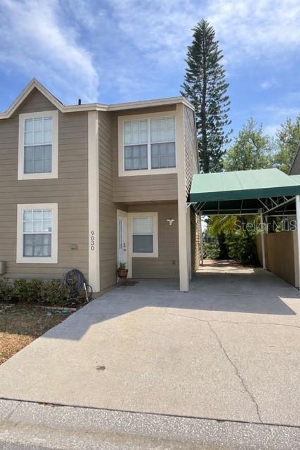 Photo of 9030 Lake Place Lane, Tampa, FL 33634 (MLS # TB8487927)