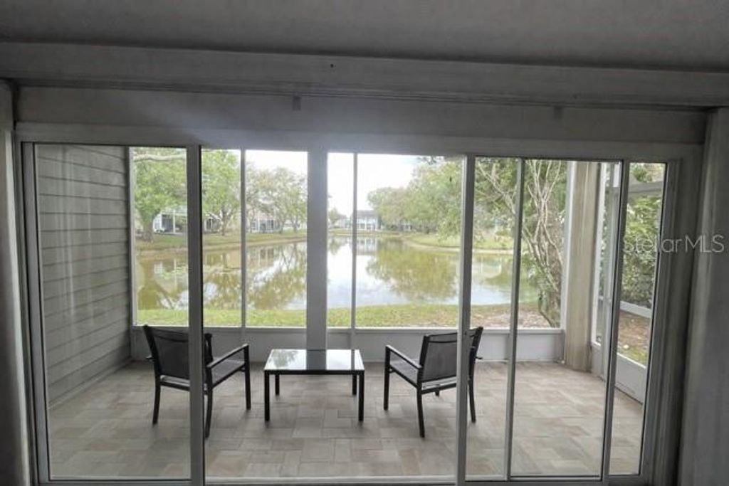 Photo of 9030 Lake Place Lane, Tampa, FL 33634 (MLS # TB8487927)