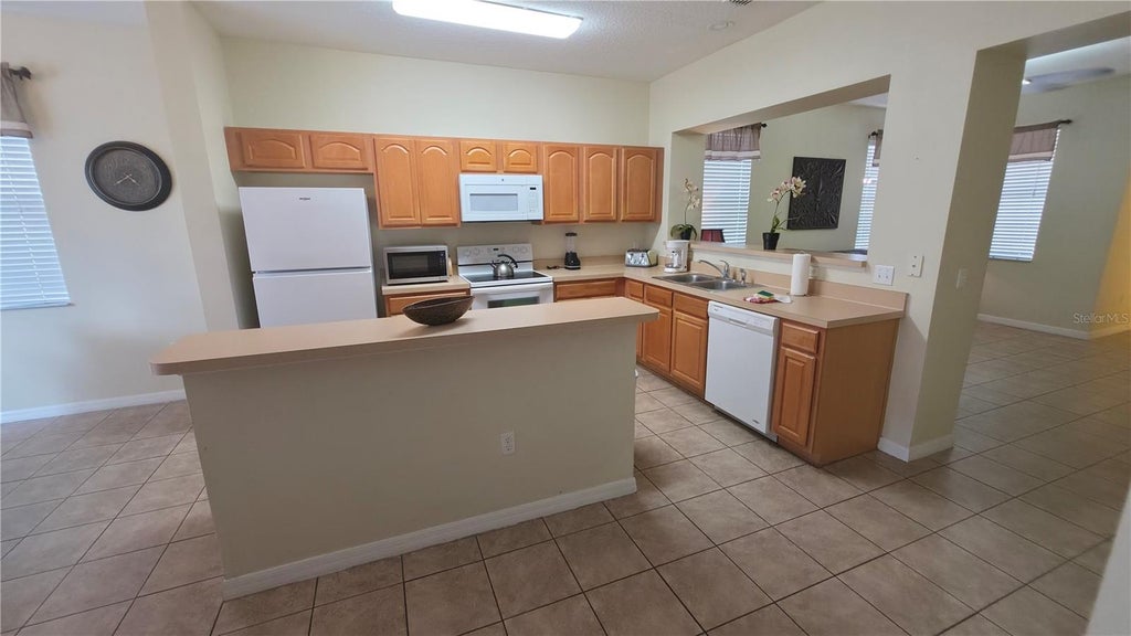 Photo of 5486 Paradise Cay Circle, Kissimmee, FL 34746 (MLS # S5157605)