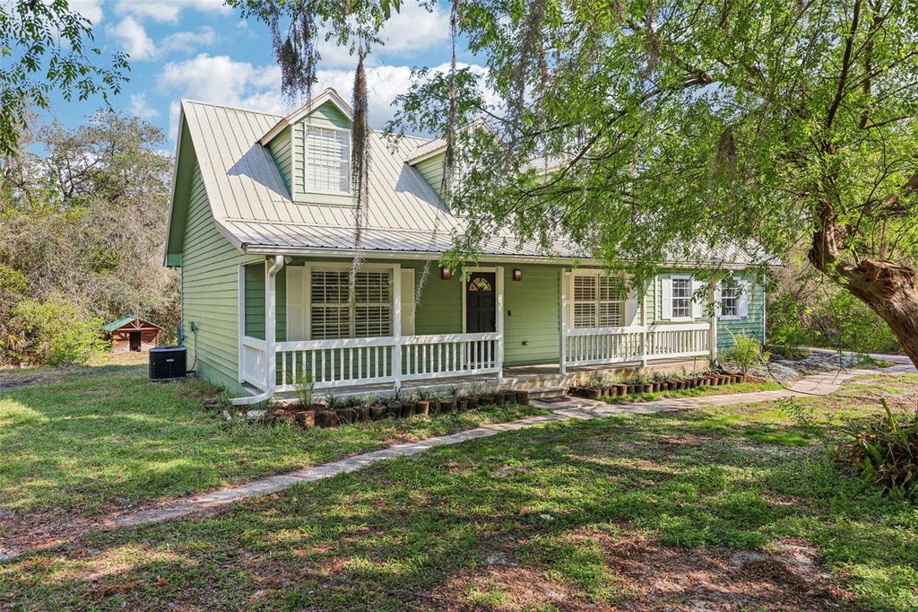 Photo of 490 Hidden Ridge Drive, Deltona, FL 32725 (MLS # TB8482278)