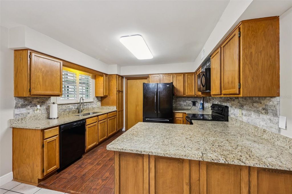 Photo of 490 Hidden Ridge Drive, Deltona, FL 32725 (MLS # TB8482278)