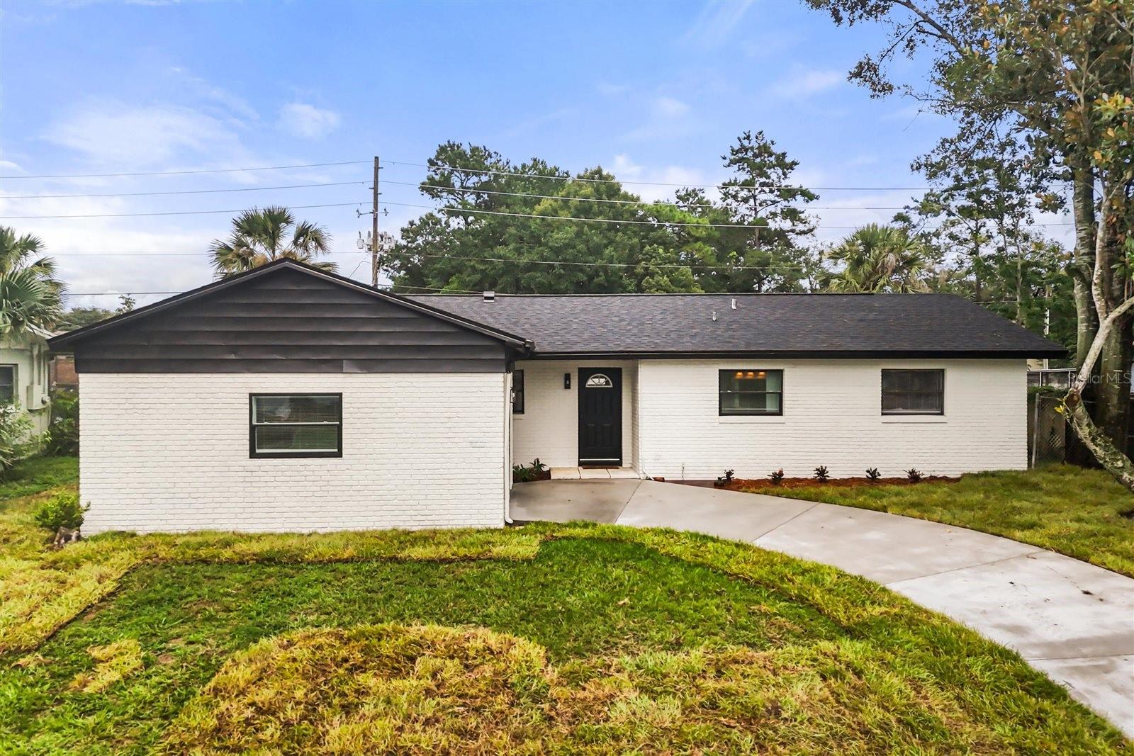 From the moment you pull up, you’ll notice the fresh exterior paint, new sod, and updated landscaping that give this home incredible curb appeal. Inside, a light-filled, open layout welcomes you with brand new finishes and thoughtful upgrades throughout.
At the heart of the home is the fully remodeled kitchen—featuring new soft-close shaker cabinets, granite countertops, stainless steel appliances, a large island, and all-new lighting and plumbing fixtures. This open-concept space flows effortlessly into the living and dining areas, with French doors and large windows letting in natural light and offering views of the pool.
Both bathrooms have been completely renovated, and all four bedrooms have been refreshed with new paint, fixtures, baseboards, flooring and ceiling fans. The fourth bedroom includes its own mini-split A/C, making it the perfect space for guests, a home office, or a private retreat.
Major systems have all been updated: enjoy a BRAND NEW ROOF, NEW HVAC, updated electrical panels, and new outlets, switches, and lighting throughout the home for comfort and peace of mind.
Step out back to relax under the newly screened patio, overlooking a resurfaced pool with new tile and a new filter—the ideal setting for year-round Florida living.
This home blends style, function, and modern upgrades in every corner. Don’t miss your chance to tour this move-in ready gem!