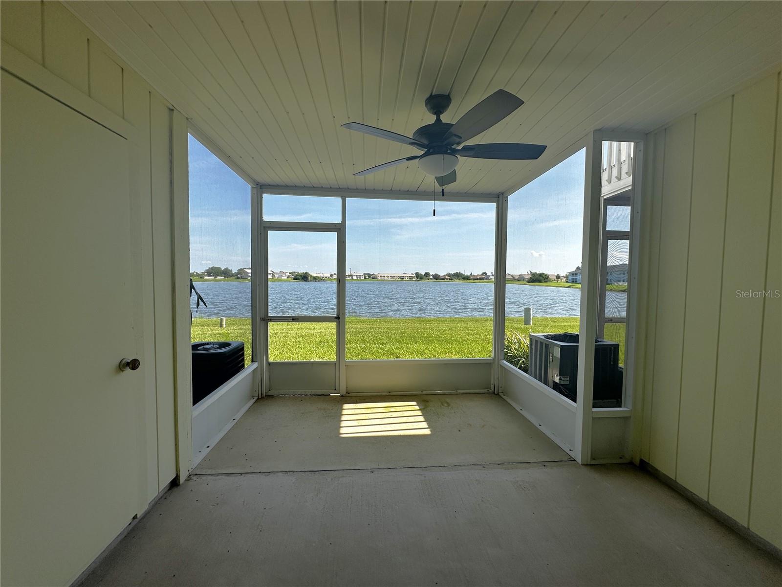 Welcome to relaxed Florida living at its finest in this lakefront townhome! Nestled in the desirable Deep Creek community, this home offers the best in tranquil living in a quiet, sought-after community. Step inside and discover an open floor plan, perfect for entertaining or unwinding. Prepare to be captivated by the tranquil lake views from not one, but two amazing outdoor living spaces. Relax and unwind on your extended screened-in lanai on the first floor, complete with a convenient storage closet. Or, head upstairs to your private balcony, perfect for savoring your morning coffee, sunbathing, or simply enjoying the breathtaking lake view. Both bedrooms upstairs have their own bathroom and there is a half bath conveniently located on 1st floor. Tons of closets/storage plus Washer/Dryer included. When you're ready to cool off, the community pool is just a few steps away. The location is unbeatable! A super-short walk takes you to the active community shopping center, with banking, shopping, dining, and more right at your fingertips. Just minutes from the Deep Creek Golf Club. And with I-75 only 2 miles away, you'll have quick access to everything Punta Gorda and Port Charlotte have to offer! (PLEASE NOTE, OWNER IS UPDATING FLOORING, LIGHTING and MUCH MORE so new pictures will be coming soon) Hurry, this one won't last at this price!