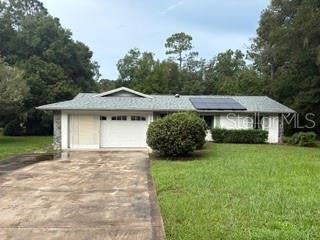 Photo of 19279 SW 96th Loop, Dunnellon, FL 34432 (MLS # OM731284)