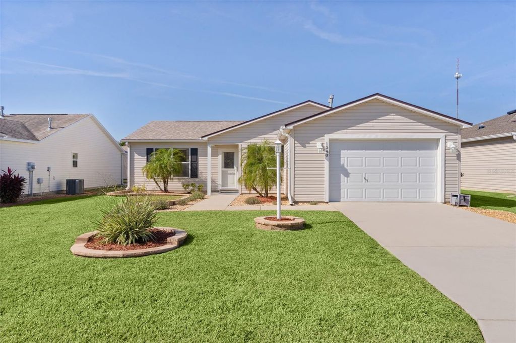 Photo of 1240 Pageland Way, The Villages, FL 32162 (MLS # G5104424)