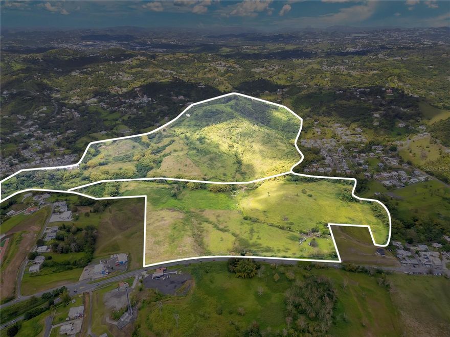 Land of approximately 594,295.25 m² (151.4 cuerdas) located in the Cayey and Cidra area of Puerto Rico. With UR (Urban Residential) and R-I (Intermediate Residential) zoning, this property is suitable for the development of high-density residential projects, multifamily complexes, or compatible commercial developments. Its accessibility to the region's main roads makes it an opportunity for developers and investors. Additionally, it is classified as Flood Zone X, indicating minimal flood risk. With a growing real estate market and sustained demand for new housing units, this land represents an investment with high return potential. Soil type: 76SRC/24SU for Spanish "Suelo Rústico Común" and "Suelo Urbano".