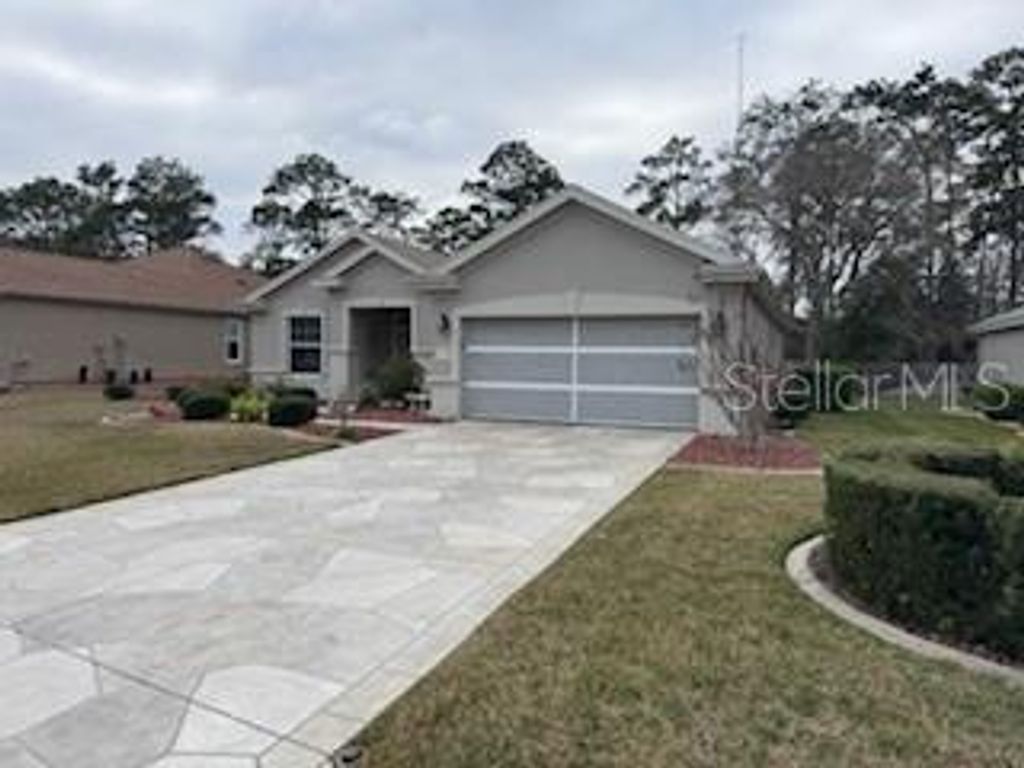 Photo of 11888 SE 91st Circle, Summerfield, FL 34491 (MLS # OM716472)