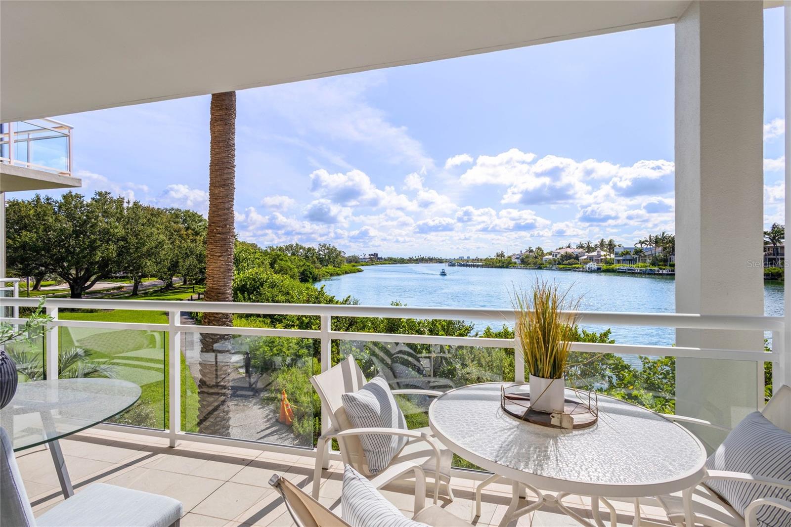 The most perfectly peaceful lagoon views are enjoyed from this first floor Junior Suite in Building 6. Unlike the other buildings, this building boasts 10' ceilings making it feel especially spacious while optimizing natural light and view. It is typical to see manatees, dolphins, paddleboarders and a variety of tropical birds from the terrace overlooking the turquoise lagoon water. Building 6 offers extra privacy as it is located across the street from the main entrance, but still close enough to enjoy the pool and beach without having to pack the car and drive anywhere. Updates to the residence include new washer/dryer, new dishwasher, new microwave, new glass shower doors, new commode, new closet shelving, and new fire alarm. This unit is not part of the hotel program; however, it can be rented out by the owner or a 3rd party vendor on a nightly basis. Owners can also become members of the Longboat Key Club to partake in the numerous Resort amenities (Golf, Tennis, Restaurants, Fitness Center, Marina) if they still want to enjoy the benefits of owning in a Resort community without being part of the hotel program.