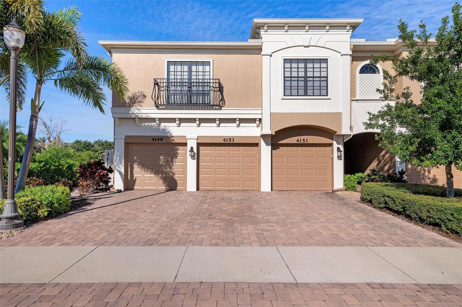 FOR RENT! Dog Friendly! Unfurnished Annual Rental. Located in Palma Sola Trace off 75th St this is a highly desirable first floor 3 bedroom, 2 bath "Drake" end unit with a garage. The inside has no carpet and is tile throughout. The kitchen has stainless steel appliances and Corian counters with solid wood maple cabinets. The lanai opens up to a lovely view of the pond. Guest parking is directly across the street. A large heated pool is up at the Clubhouse with a full fitness center, library, kitchen and meeting plus party room. There are walking trails and a new playground area. All this and only a few miles to the world-class beaches of Anna Maria Island and close to Robinson Preserve. There is also the "Shoppes of Paradise Bay" just around the corner with great options for shopping and dining! Washer and Dryer are included. Community provides lawn care, basic cable, and basic internet.