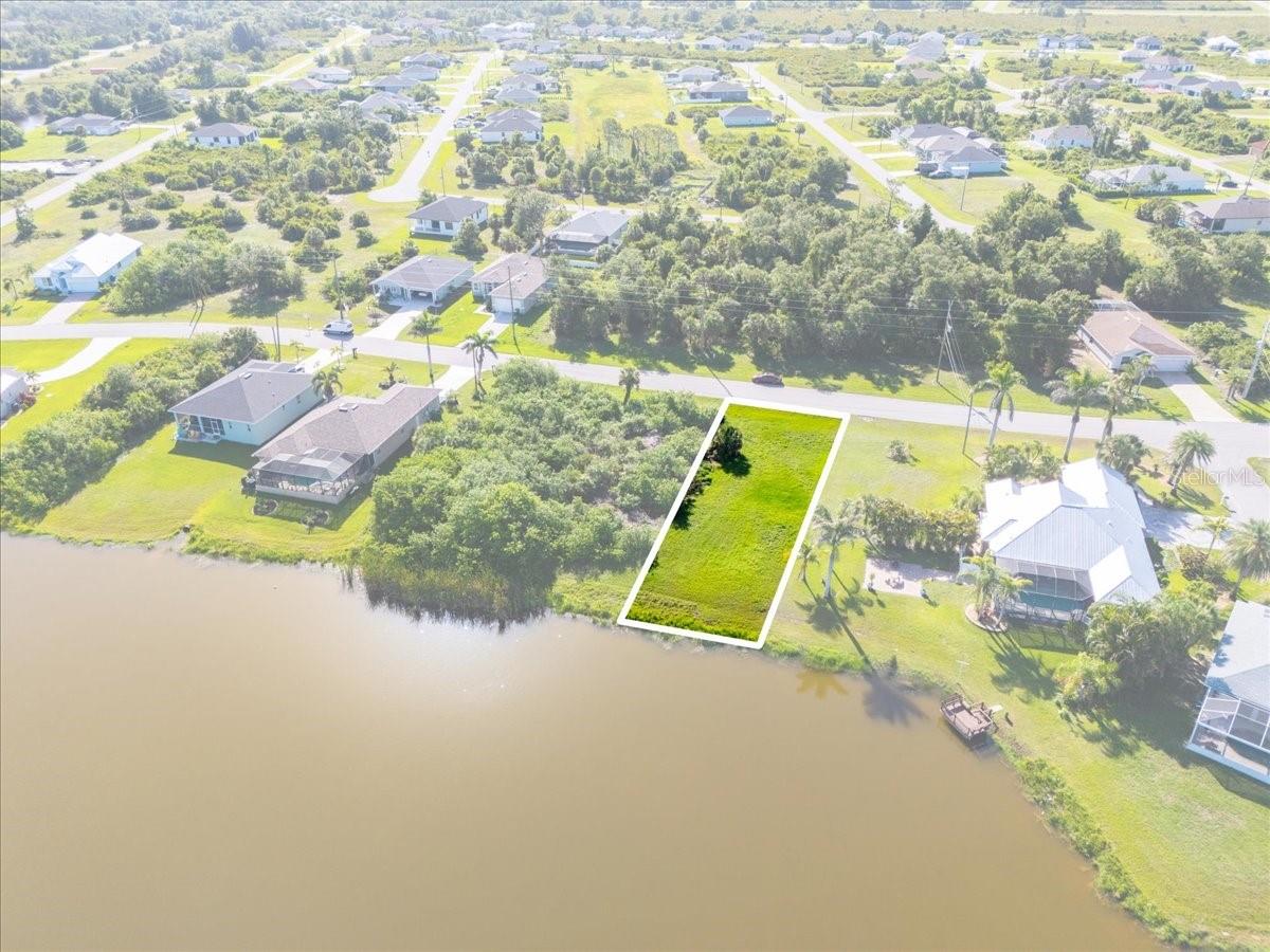 Welcome to your opportunity to own a prime lakefront lot in the highly sought-after, deed-restricted community of Rotonda Lakes! This beautiful parcel offers breathtaking water views, central water and sewer access nearby, and is not currently in a Scrub Jay habitat (as per the Charlotte County GIS maps – buyer to verify).This lot provides a peaceful and private setting while still being just minutes from the best that Southwest Florida has to offer. Nestled in a quiet neighborhood with newer homes and well-maintained surroundings, you'll enjoy the welcoming atmosphere that Rotonda Lakes is known for. Conveniently located near some of Florida’s most desirable attractions, this lot is just a short drive from the white sand beaches of Boca Grande, Englewood, and Manasota Key. Outdoor enthusiasts will appreciate the proximity to multiple golf courses, scenic walking trails, and the Rotonda Community Park. You'll also find shopping, dining, and medical facilities easily accessible in nearby Port Charlotte, North Port, and Venice. For boaters and anglers, the area offers quick access to marinas, boat ramps, and world-class fishing destinations. Low annual HOA fees and sensible deed restrictions help protect your investment while allowing you the freedom to create your perfect home. Whether you're looking to build now or hold for the future, this lot is an ideal choice. Don't miss your chance to own a slice of waterfront Florida living – contact us today for more information on this incredible lot.