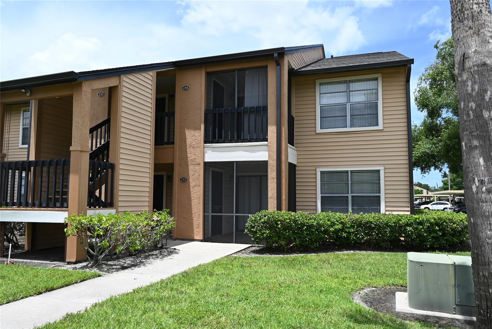 Great 1 bedroom condo unit in Bal Harbor is now available in Largo. Second floor unit in a walk up building with screened in balcony. Solid surface kitchen counter and stainless appliances and washer/dryer included. Island kitchen is open to the living room. Laminate flooring, covered parking and great community amenities including clubhouse, pool, tennis courts, putting green and volleyball. Extra storage closet on balcony. Covered parking. This is a gated community with a mix of owned condos and apartments. This unit is privately owned.