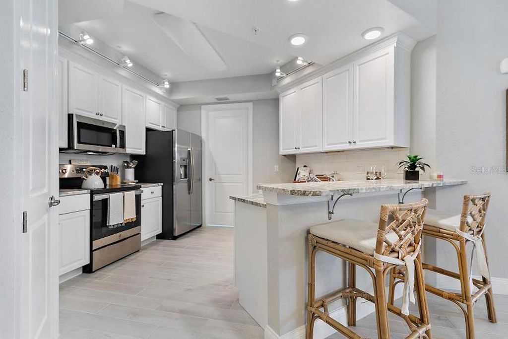 Photo of 2 Riverwalk Drive #202, New Smyrna Beach, FL 32169 (MLS # NS1087870)