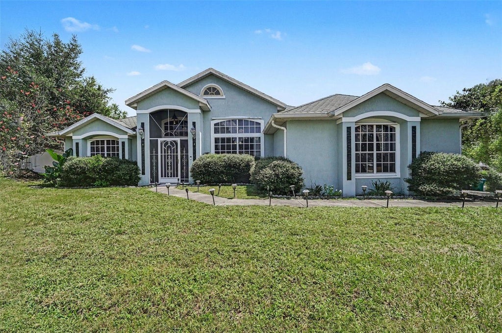 Photo of 1211 Nixonton Street, Deltona, FL 32725 (MLS # V4951068)