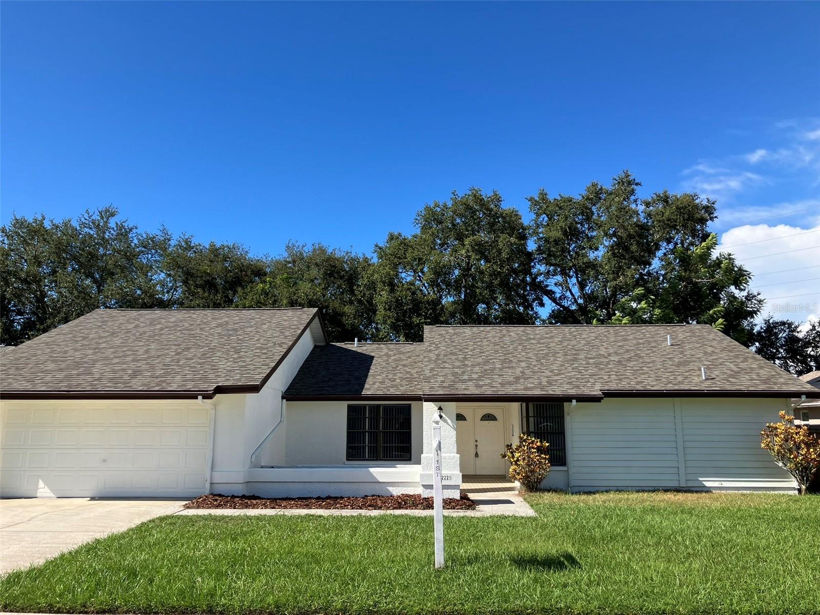 Hi and dry neighborhood with top rated schools is just a short drive from rustic downtown Palm Harbor. Put your finishing touches on this roomy split floor plan featuring cathedral ceilings along with loads of storage space. Features formal dining room and generous storage closets throughout. Inviting backyard with no rear neighbors has plenty of room for a pool. Master bedroom features roomy walk-in closet along with large bath that has two sink areas, spacious shower and new commode. Fourth bedroom offers double entry door that would be ideal for an office. Recent improvements include new shingle roof, fresh exterior paint and water heater. HVAC 2013. Sought after neighborhood close to schools, shopping, restaurants and Pinellas Trail. Low HOA at only $240 annually. Room sizes approximate. Washer & Dryer not warranted.