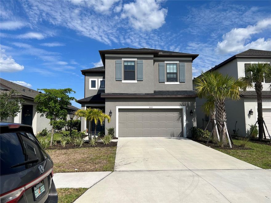 Welcome to this stunning 4-bedroom, 2.5-bath home in the highly sought-after gated community of Grandview at the Heights — where modern comforts meet timeless charm! Built in 2021, this nearly new two-story residence offers 2,440 square feet of thoughtfully designed living space, with plenty of room to grow, relax, and entertain. Priced as one of the best values in the community, this is an opportunity you won’t want to miss.
You’ll love the unbeatable location — just minutes from the shops and restaurants at UTC, I-75, and University Parkway. A quick drive takes you to SRQ Airport and the pristine white-sand beaches of Sarasota and Bradenton. Enjoy community amenities with low HOA fees and no CDD: a sparkling swimming pool, playground, basketball court, and kayak launch to Ward Lake. Plus, you’re steps from Tuttle Creek Park, offering 2 miles of walking trails, fitness stations, and a dog park to support an active lifestyle.
Step inside and be greeted by a light-filled, open-concept design accented by fresh neutral paint throughout. The spacious first floor flows seamlessly from the welcoming family room to the bright kitchen — the heart of the home. Here, white cabinetry, gleaming quartz countertops, a large undermount sink, and an oversized peninsula make it easy to prep meals or entertain guests.
Upstairs, the smart split-bedroom layout ensures privacy and comfort. The oversized primary suite features a cozy sitting area, a massive walk-in closet, and a spa-like bath with dual vanities, a soaking tub, a walk-in shower, and a private toilet room. Across the hall, you’ll find three generous guest bedrooms and a full bath  — perfect for family and visitors. 
Out back,large yard provides endless potential — whether you’re dreaming of building a pool, hosting gatherings, or simply relaxing while enjoying serene lake views and Florida’s breathtaking sunrise. 
This beautiful home blends style, function, and community living, making it the perfect place to create lasting memories. Don’t miss your chance to call it yours — schedule your private tour today!