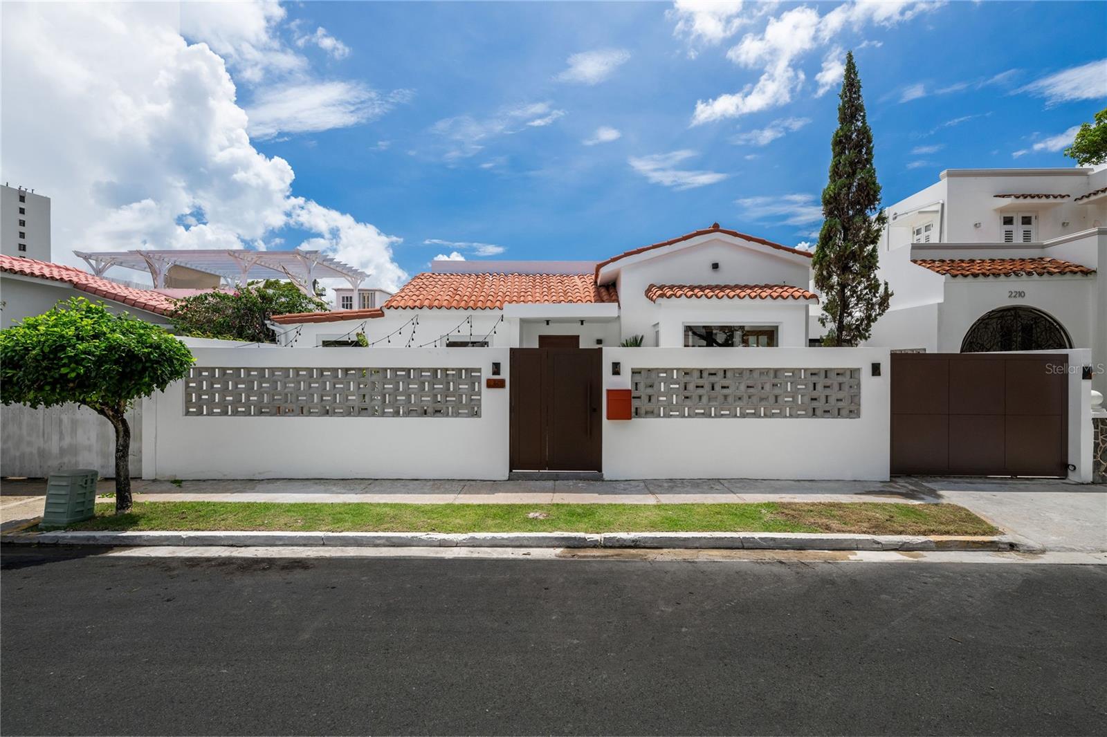 Discover a fully renovated Spanish style residence that perfectly blends modern design with timeless character. This elegant home showcases custom woodwork, original Spanish tiles, and a seamless indoor outdoor flow ideal for entertaining and relaxing. Nestled within a quiet gated community just steps from the beach, the property offers a rare combination of privacy, walkability, and coastal lifestyle an exceptional find in one of San Juan’s most desirable neighborhoods. This residence has been fully renovated with high quality finishes and features a spacious layout that connects interior and exterior spaces effortlessly. Custom carpentry and historic Spanish tile details bring warmth and authenticity throughout, while its location offers the perfect setting for gatherings or peaceful retreat.Perfect as a primary residence or as a high end rental investment. Ideally situated in the heart of Santa Teresita, one of San Juan’s most sought after coastal enclaves, 2212 Calle General del Valle offers unmatched convenience. Just a short walk to the sand, top rated schools, parks, and some of the city’s best dining and boutique shopping, it combines everyday comfort with coastal serenity. Easy access to major thoroughfares and the airport makes this location ideal for both full Time living and effortless weekend escapes.