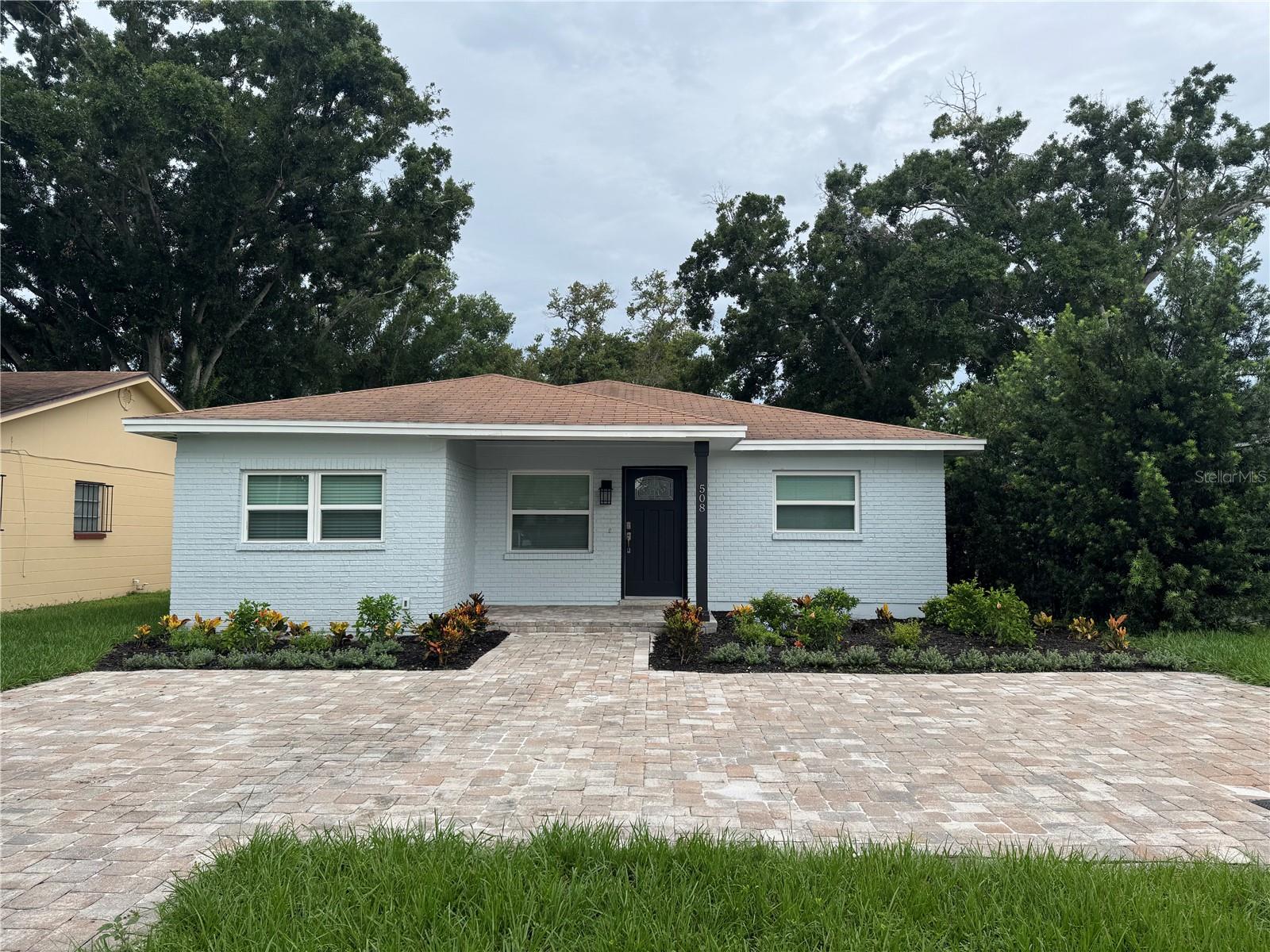 Move-in ready 3-bedroom, 2-bath home located in the heart of South Tampa, zoned for top-rated schools Mitchell Elementary, Wilson Middle, and Plant High. The interior features fresh paint and a gourmet kitchen with white cabinets, crown molding, granite countertops, a deep farmhouse sink with a newer faucet, stainless steel appliances, recessed lighting, and plenty of storage. The home includes a washer and dryer, along with an indoor laundry/utility room for added convenience. The primary suite boasts a spacious closet, ceiling fan, and en-suite bath with a granite vanity, glass-enclosed shower, and upgraded fixtures. Two additional guest bedrooms, each with large closets and ceiling fans, share an updated bathroom with a granite vanity and modern fixtures. Conveniently located within walking distance to a community park, a new Aldi grocery store, and the popular Midtown shopping complex, this home is just minutes from Kennedy Blvd, I-275, and Downtown Tampa.