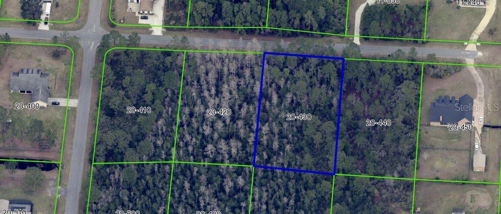 Prime vacant lot available in the sought-after community of Wedgefield! This property is the perfect opportunity to design and build your dream home, surrounded by a neighborhood that offers a golf course, country club, parks, nature trails, and more. Conveniently located just minutes from Orlando International Airport, with easy access to downtown Orlando, world-famous theme parks, and Florida’s beautiful beaches, this lot provides endless possibilities—whether you envision a peaceful retreat or a modern home for entertaining. Don’t miss your chance to own a piece of Florida paradise!