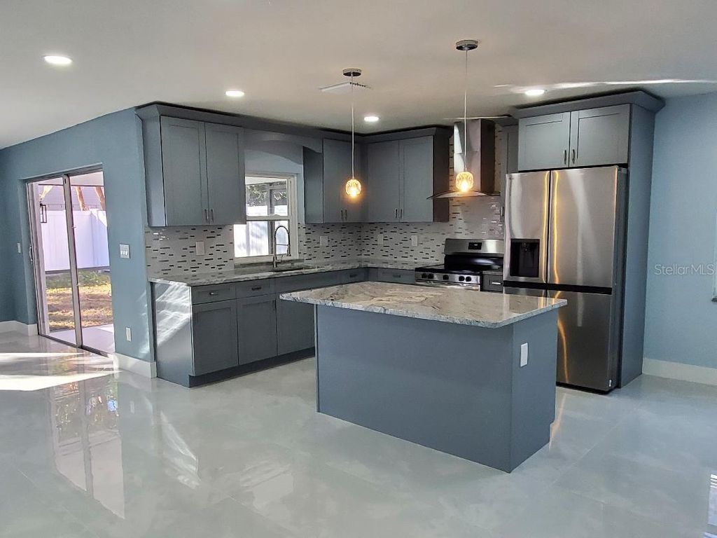 Photo of 7607 Winging Way Drive, Tampa, FL 33615 (MLS # TB8463582)