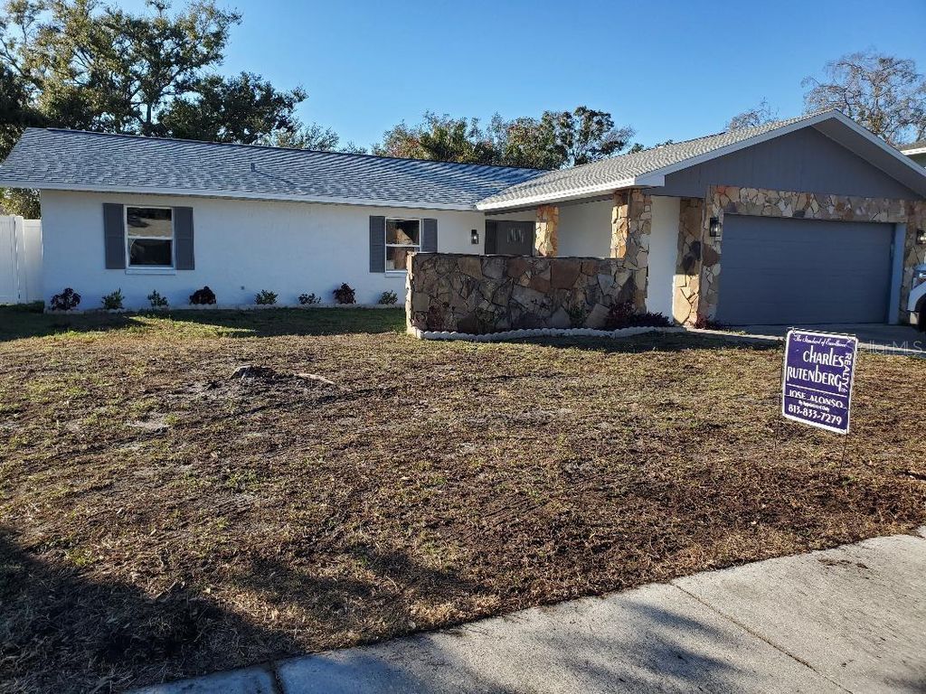 Photo of 7607 Winging Way Drive, Tampa, FL 33615 (MLS # TB8463582)