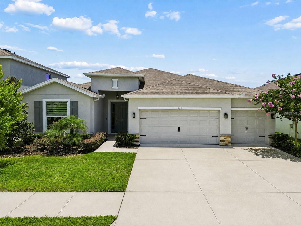 Photo of 7629 Broad River Avenue, Land O Lakes, FL 34638 (MLS # TB8517740)