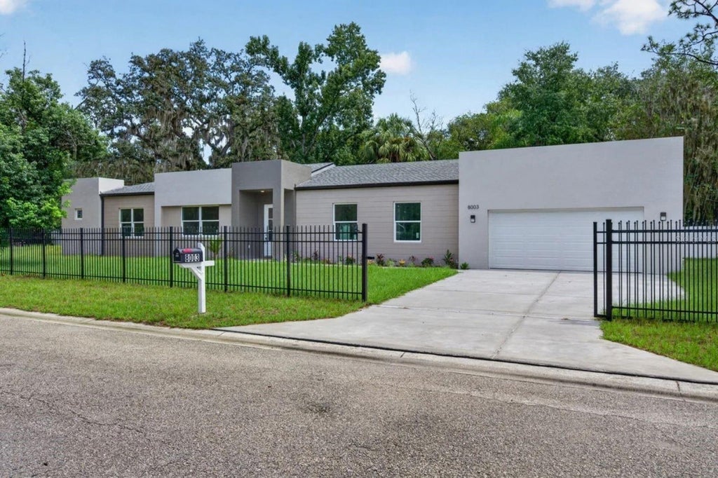 Photo of 8003 Chaney Lane, Tampa, FL 33617 (MLS # TB8550614)