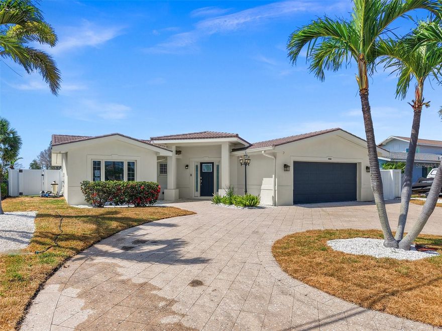 Motivated Seller bring your offer! 

Wake up to breathtaking wide-open water views and launch your boat straight into the Intracoastal—this luxury-remodeled coastal home is the ultimate waterfront lifestyle.

Perfectly positioned just minutes from the sandy shores of Treasure Island's Beach, top-rated restaurants & bars with live music, boutique shopping, & close to the weekend farmers market.  This 3-bedroom, 2-bath concrete block home has been completely transformed with high-end finishes and a fresh, modern design.

Inside, the open-concept layout flows effortlessly from the designer kitchen to the dining and living areas, all framed by expansive water views. Sleek new large Tile flooring, upscale lighting, and refined fixtures add sophistication and ease throughout.

Step outside to your resort-style pool built in 2019 overlooking the water, while the new seawall in 2018 and galvanized metal roof put on in 2009 ensure long-term peace of mind. Whether you're sailing, fishing from your dock, kayaking, or cruising to the Gulf with no fixed bridges, this home is made for those who live for salt air and sunsets.

While the property did experience flooding during the hurricane; it was issued a non-substance letter.  It has been fully and tastefully renovated, making it move-in ready for a discerning buyer seeking true waterfront living with the best of Treasure Island at your doorstep and downtown St. Petersburg just a short drive away.  Check out this video - https://youtu.be/np_r70jvqZc