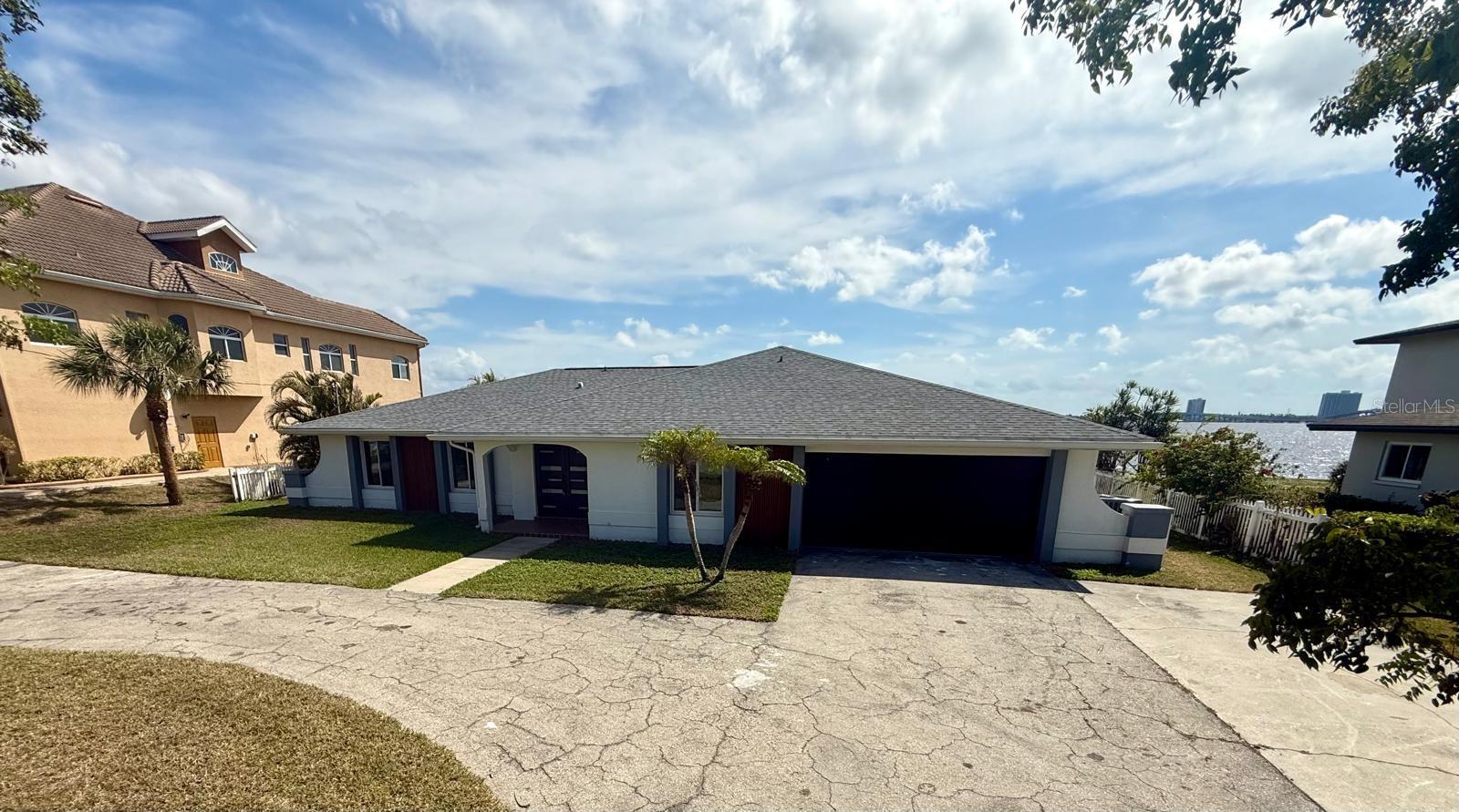 Unique Opportunity in North Fort Myers! Discover this stunning 2,549 sqft home in the exclusive North Shore Avenue neighborhood! This
beautiful property boasts 4 bedrooms, 2 of them are master. Plus versatile den or office. Open design that perfectly blends comfort and
elegance. Everything is new in this house, kitchen cabinets, top of the line appliances, porcelain floors, all 3 bathrooms are new, all impact
windows and doors, recently installed new shingle roof. Beautiful in ground pool and private boat dock on the Caloosahatchee River right on
your backyard and open waterway directly to the Gulf of Mexico.