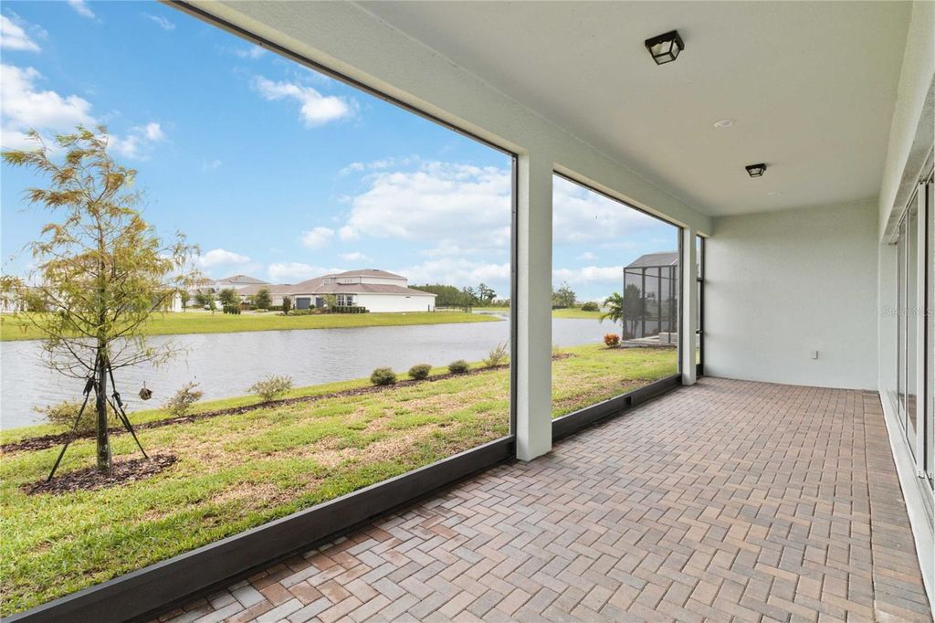 Photo of 13823 Tybee Beach Lane, Orlando, FL 32827 (MLS # O6410050)