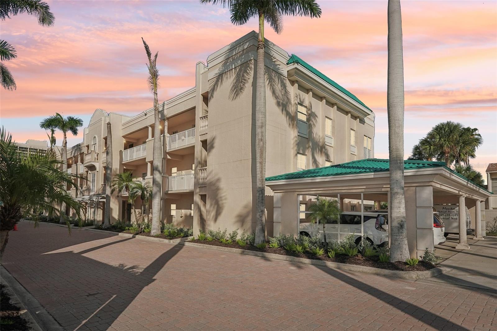 One or more photo(s) has been virtually staged. OPPORTUNITY AWAITS! This first-floor end-unit condo is ready for your personal touches. Featuring 2 bedrooms and 2 bathrooms, it can serve as your primary residence, vacation retreat, or an income-producing rental with both weekly and seasonal leasing opportunities. The welcoming foyer offers a large storage closet, while the spacious great room opens to an enclosed lanai with sliding glass doors, perfect for enjoying the refreshing Gulf breezes. The primary suite includes an oversized walk-in closet, private lanai access, and a bath with a step-in shower and glass doors. Covered carport parking is conveniently located just outside your unit. Enjoy private access to world-famous Siesta Key Beach, or take advantage of the community’s many amenities, including two pools, a spa, tennis courts, and a fully equipped fitness center. For boaters, slips are available on a first-come, first-served basis along the Intracoastal Waterway. On-site Palm Bay rental management and concierge services make ownership truly worry-free and enjoyable.