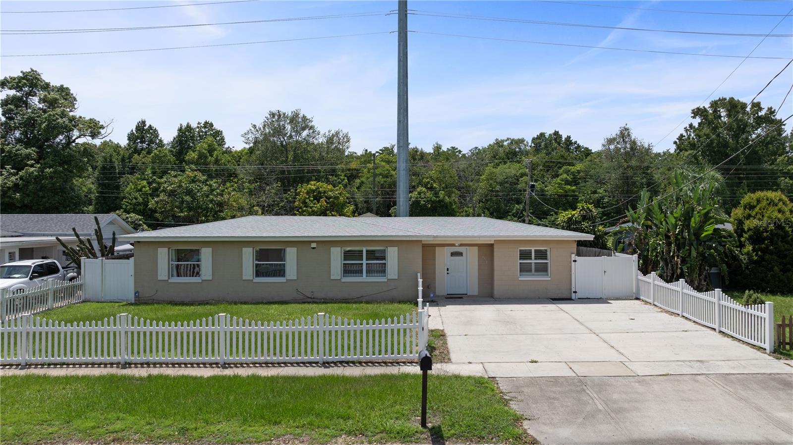 Spacious and well-kept 4-bedroom, 2-bathroom home available for rent in a convenient Orlando location. This home features a split floor plan, tile flooring throughout, and an open living and dining area with great natural light. The kitchen includes all appliances, plenty of cabinet space, and a breakfast bar that connects to the main living area. Enjoy the comfort of an indoor laundry area and a large screened-in patio, perfect for relaxing or entertaining. The backyard includes a built 400 sq ft detached garage, great for storage or additional workspace. Located close to major highways, schools, shopping, and restaurants.