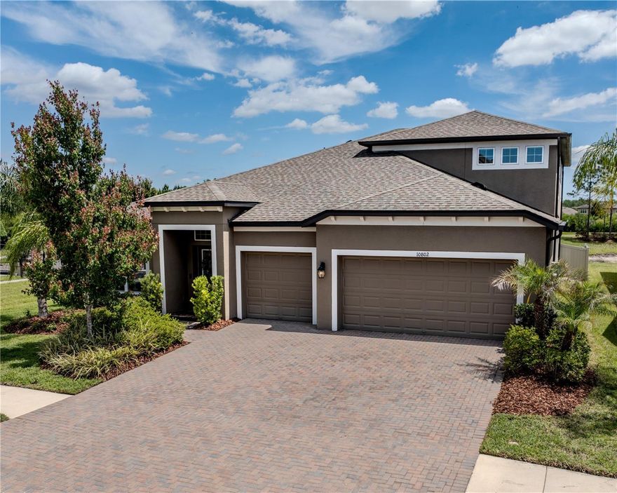 Corner Lot | Water Views | Thoughtfully Designed Layout in K-Bar Ranch II
Welcome to 10802 Rolling Moss Rd, a well-appointed corner-lot home in the highly desirable K-Bar Ranch II community of New Tampa, offering water views, flexible living spaces, and a thoughtful layout designed for everyday comfort.
The primary suite serves as a private retreat, featuring a spacious layout, walk-in closet, and a private en-suite bath.
Designed with comfort and functionality in mind, this New Tampa home features a bathroom conveniently located adjacent to every additional bedroom, plus a flexible office and upstairs bonus space tailored to today’s lifestyle needs.
A dedicated office/den with a custom built-in oak desk adds valuable flexibility for remote work or study, while the upstairs bonus space provides additional room for media, play, fitness, or relaxation.
The gourmet kitchen serves as the heart of the home, featuring quartz countertops, a gas range, double ovens, RO system, abundant cabinetry, generous counter space, and all appliances included—making it both functional and move-in ready. Additional upgrades include a 2021 roof, on-demand water heater, paver driveway and sidewalk for enhanced curb appeal and convenience.
Enjoy everyday Florida living in the screened lanai overlooking peaceful water views, complete with a spa hot tub that creates the perfect setting for relaxing or entertaining outdoors. The backyard also includes a BBQ Grill and garden box for herbs, flowers, or seasonal planting.
Residents of K-Bar Ranch II enjoy access to a resort-style amenity center with pool, tennis courts, and playground, enhancing the community lifestyle with recreation.
Zoned for top-rated schools, this home offers a strong combination of location, layout, and lifestyle in one of New Tampa’s most sought-after communities.