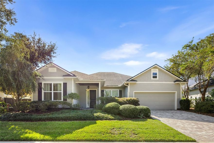 Sellers offering closing cost assistance to Buyers! Experience exceptional living in this stunning 3 bedroom, 2 bathroom home, perfectly situated in the highly sought-after Arbor Greens community. Designed for modern comfort and style, this residence also features a versatile office/flex room, ideal for working from home or a dedicated hobby space. Step inside to discover an inviting atmosphere marked by elegant wood floors, a cozy fireplace, and stunning architectural details including tray ceilings and rustic wood beams. The newly painted interior provides a fresh, move-in-ready feel. The heart of the home is a chef's delight, boasting a gourmet kitchen equipped with a gas stove, luxurious granite countertops, and sleek stainless steel appliances. Outdoor living is effortless with an oversized screened porch, perfect for enjoying the beautiful Florida weather overlooking the meticulously green manicured yard. The home's curb appeal is undeniable, featuring a charming facade with a brick paver driveway and walkway and a welcoming wood accented porch ceiling. Location is everything! This home offers an extremely walkable lifestyle, less than one mile from the vibrant Tioga Town Center. Enjoy unparalleled convenience with easy access to a variety of restaurants, boutique shopping, a grocery store, pre-schools, a fitness center, physical therapy, and more! Don't miss the opportunity to make this exquisite Arbor Greens property your new address!