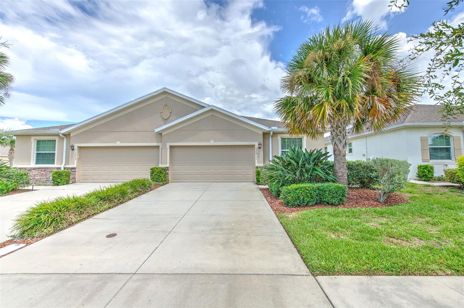 This beautifully upgraded villa in the sought-after Windchase community with a 4.6% assumable FHA mortgage is perfect for those seeking low-maintenance living in a golf-cart friendly community. The HOA fee includes roof, exterior paint, and lawn maintenance, in addition to resort-style amenities such as a community pool, fitness center, basketball and tennis courts, and playground. This stylish villa includes thoughtful upgrades that go beyond builder-grade finishes, such as fresh interior paint, light fixtures, kitchen backsplash, stonework on the kitchen island, a water filtration system, and more. As you step into the living room, you are greeted by high ceilings and abundant natural light. The spacious kitchen includes a large island overlooking the dining room. The primary bedroom offers an impressive tray ceiling, walk-in closet, and ensuite bathroom with dual sinks. The second bedroom with glass double doors and a walk-in closet makes the perfect office, guest room, or home gym. The third bedroom is situated at the end of the split floor plan and next to the full hallway bathroom with dual sinks, optimizing privacy. This stunning home is located less than 1 mile away from Publix and Starbucks and less than 4 miles away from I-75, plus offers proximity to coveted schools.