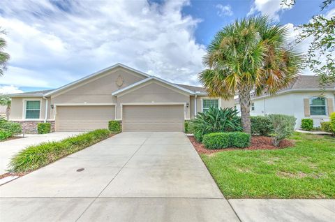 Photo of 32811 Woodthrush Way, Wesley Chapel, FL 33545 (MLS # TB8415270)