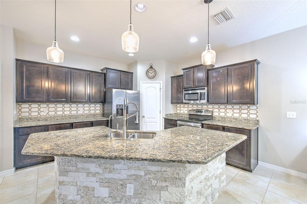 Photo of 32811 Woodthrush Way, Wesley Chapel, FL 33545 (MLS # TB8415270)