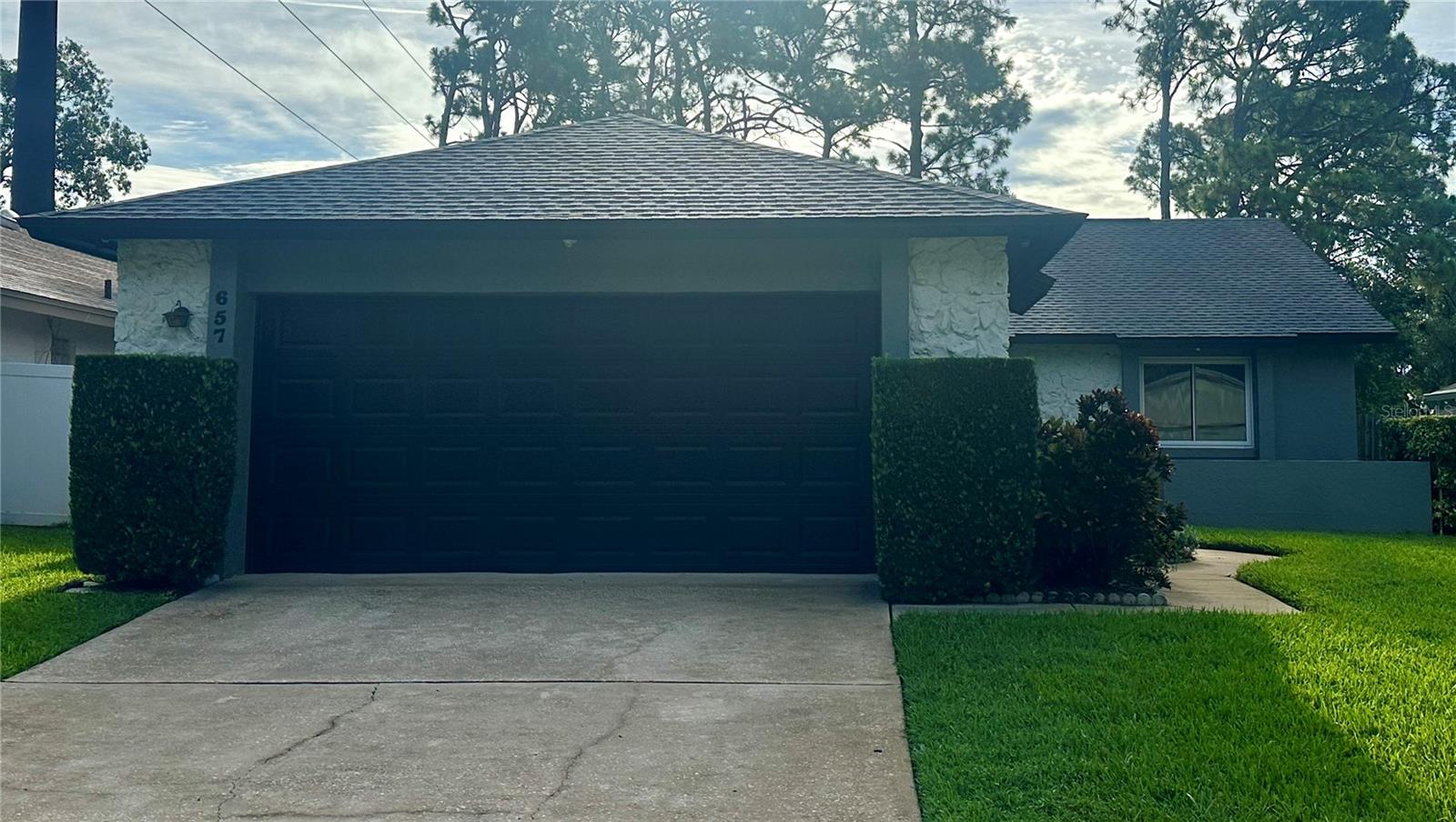 Welcome home to 657 Airmont Avenue in Altamonte Springs! This three bedroom, two bath single family home is available now for move in! Upon entering the home, you are welcomed into kitchen overlooking the spacious living area. The kitchen features a full suite of appliances, including the refrigerator, range, over the range microwave, dishwasher as well as plenty of cabinetry and counter top space. Enjoy plenty of natural light throughout the home! The primary bedroom is spacious, with private access to the primary bath featuring a large vanity, glass enclosed standing shower and a walk in closet. Both additional bedrooms are well sized, with easy access to the second full bath. Rounding out this home is the two car garage and spacious backyard! This home will not last long!