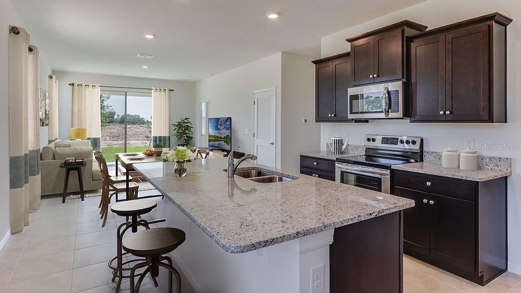 Photo of 8590 Pinecrest Trail, Wildwood, FL 34785 (MLS # OM719622)