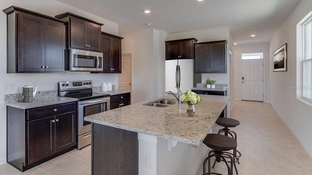 Photo of 8590 Pinecrest Trail, Wildwood, FL 34785 (MLS # OM719622)