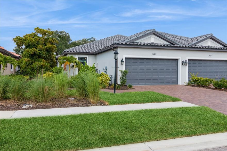 Relax and enjoy this furnished villa nestled within popular resort-style Skye Ranch community. This lovely turnkey 2 bedroom/2 bath attached villa offers a unique blend of modern elegance and serene comfort. Featuring an inviting open floor plan accentuated by a picturesque backyard water view, the villa welcomes you with a spacious study room or additional accommodation for relaxation or visiting guests. The heart of the home lies in the kitchen, with quartz countertops and equipped with stainless steel appliances, inviting kitchen island and casual dining alike. Enhancing the ambiance, both bedrooms, gathering room and study have ceiling fans to gently circulate the air throughout. Serenity awaits as you step outside onto the extended screened covered patio and immerse yourself in tranquility as you overlook the water view and lovely foliage from the wetlands, creating an idyllic backdrop for friendly gatherings or moments of peaceful reflection. This stunning villa is a short walk to the Esplanade only Rendezvous Park featuring resort-style pool, pickle ball courts, bocce courts, firepit and dog park. Adding to the benefits of living in a resort-style community, you get additional access to the Hub featuring an amazing resort-style pool, lap pool, state-of-the-art fitness center, rock climbing wall, café and more. Whether enjoying the vibrant resort-style community amenities or enjoying quiet evenings at home, this villa epitomizes modern living at its finest, offering a harmonious blend of luxury and relaxation in an unparalleled setting. Whether you're wanting to experience living in the area or waiting for your new construction to be completed, this villa is a fantastic way to do either. Call for a showing today!