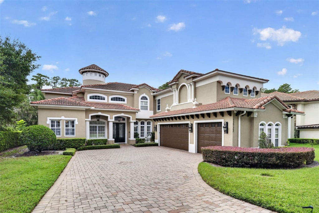 Photo of 12722 S Lake Sawyer Lane, Windermere, FL 34786 (MLS # O6437802)